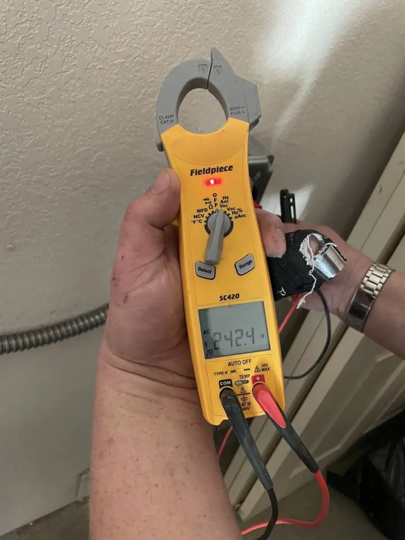 Voltage testing with clamp meter during Outlet Installation in Catskill